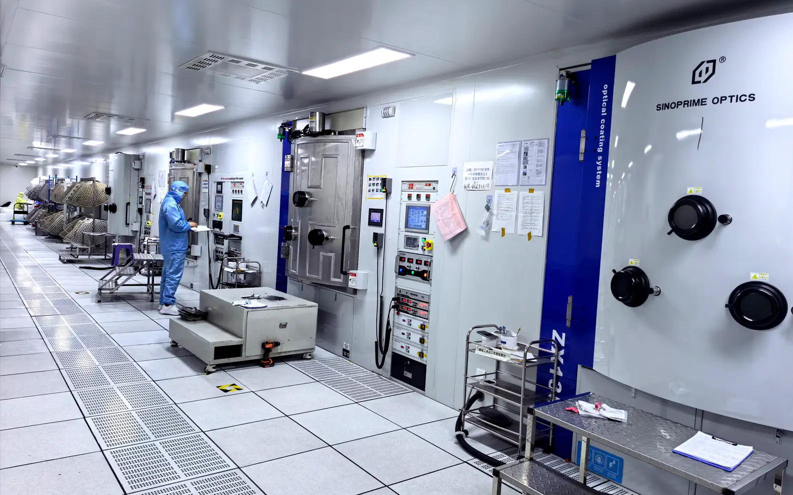 Optical coating equipment in a clean manufacturing facility