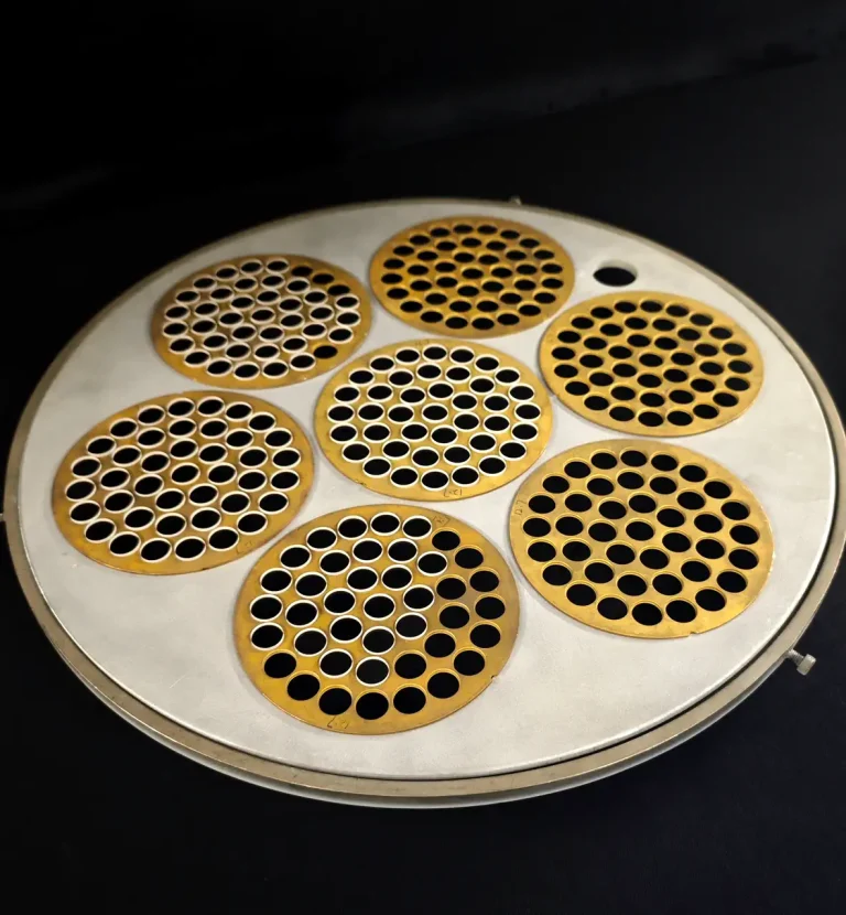 Optical lens coating fixtures used for precision laser optics production