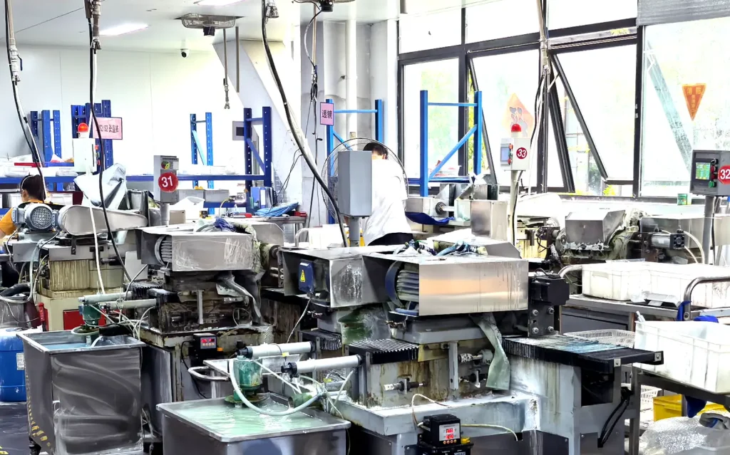 Optical lens grinding and polishing workshop with production equipment