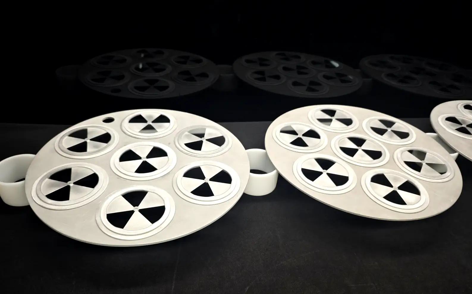 Standard optical lens components prepared for manufacturing and coating