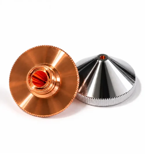 Copper and chrome fiber laser cutting head nozzles on white background